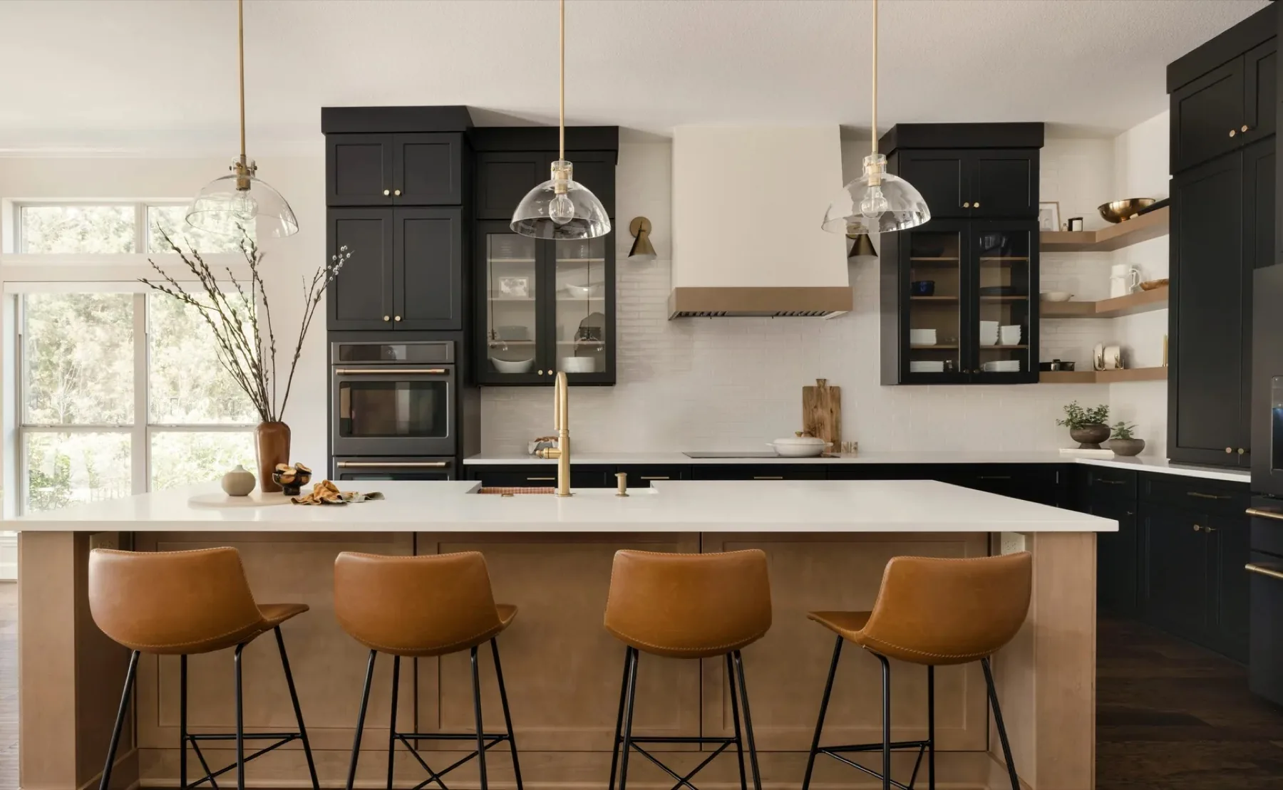 Flint Rock Loop Residence kitchen with deep black cabinetry and white oak open shelving
